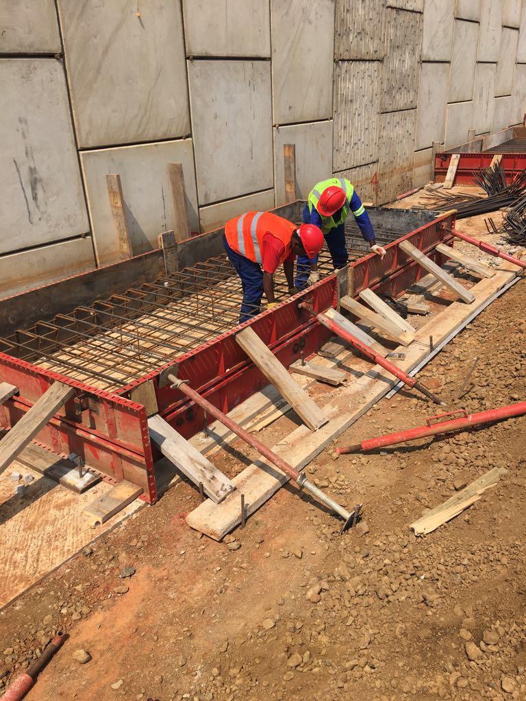 a group of men working on a construction site